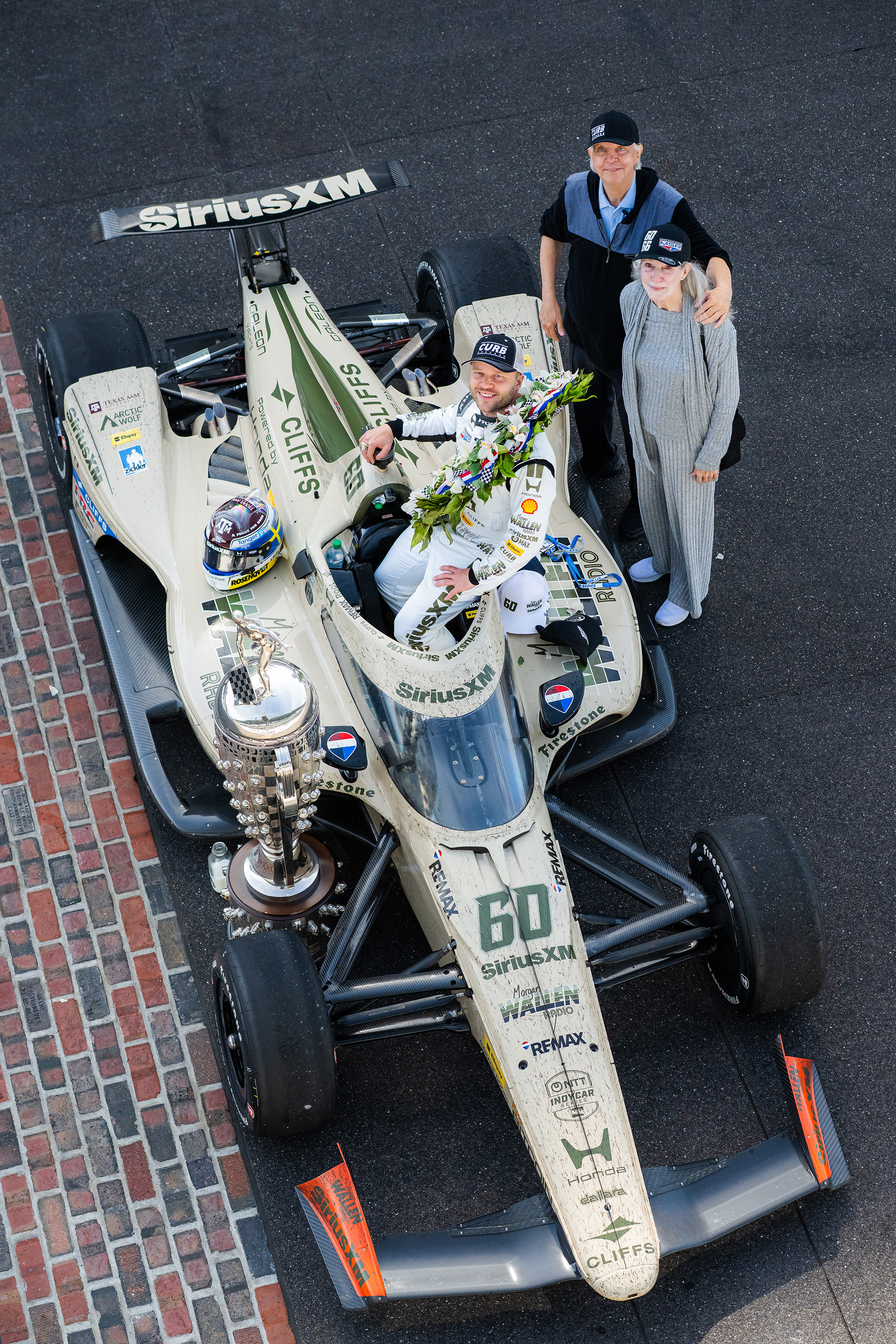Mike and Linda Curb with Felix Rosenqvist, winner 2026 Indy 500